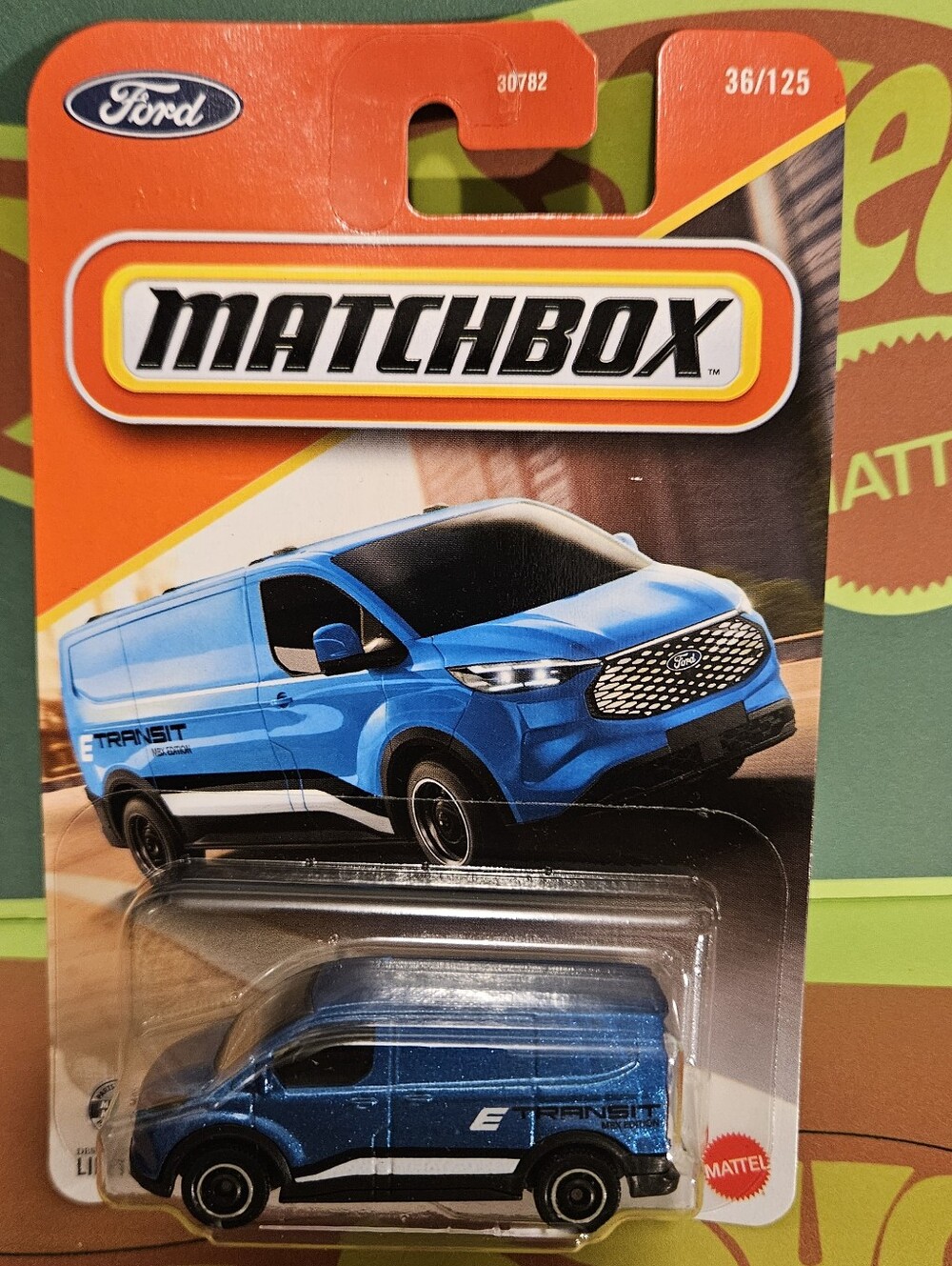 Matchbox Ford E-Transit Custom Van — Teal, Black, White